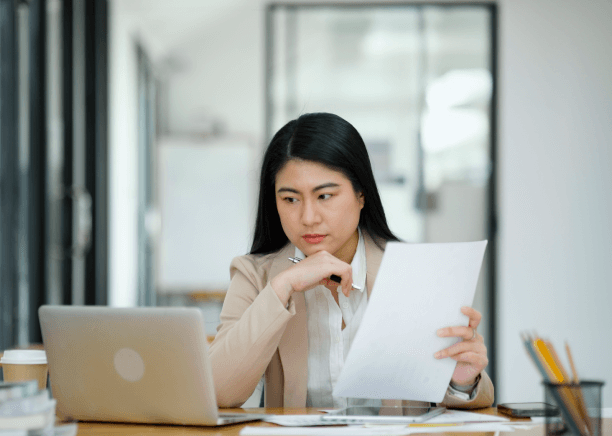 A certified translator working on ATA certified Marriage Certificate translations in Miami for personal documents.