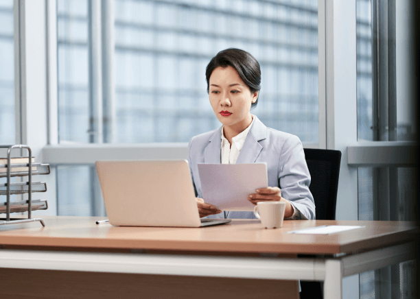 A certified translation of USCIS immigration paperwork is checked line by line, highlighting Spanish Translation Services.