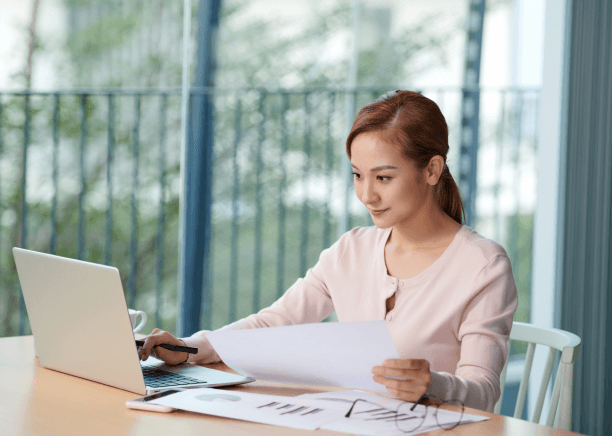 A client receives a certified packet marked guaranteed acceptance, highlighting French Translation Services in Miami.