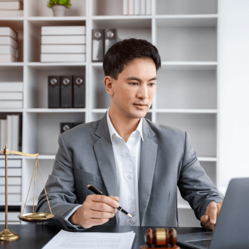 Lawyer reviews a translated legal brief at a Miami desk, using French Translation Services in Miami for accurate legal