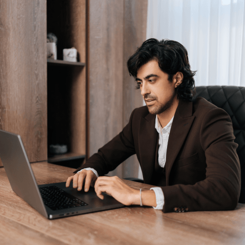 A translator compares an English manual to Portuguese text, delivering Portuguese Translation Services in Miami.