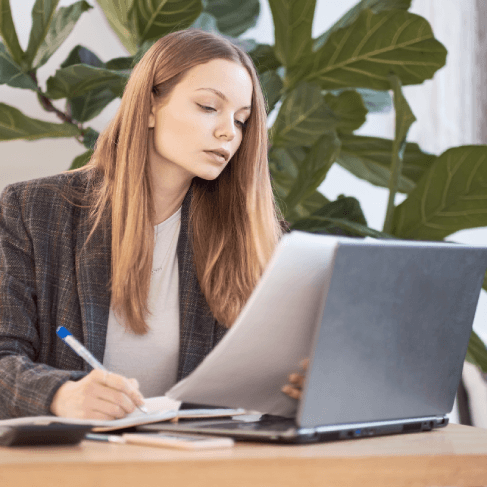 A Miami manager reviews a certified Russian contract translation with a stamp, using Russian Translation Services in Miami.